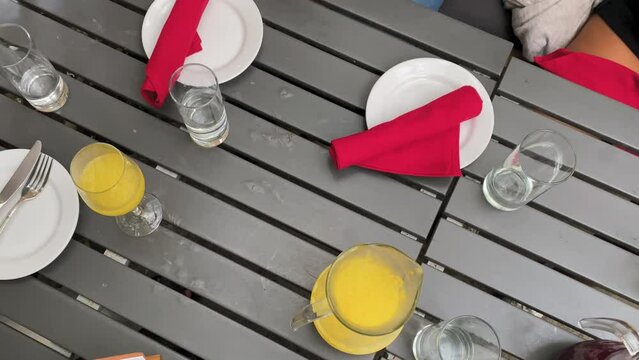 Friends toasting (cheers) with drinks at a bar or restaurant