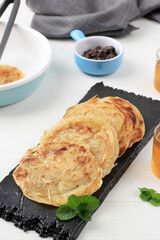 Roti Canai or Paratha Parotta Flat Bread, Also Known as Roti Maryam in Indonesia.
