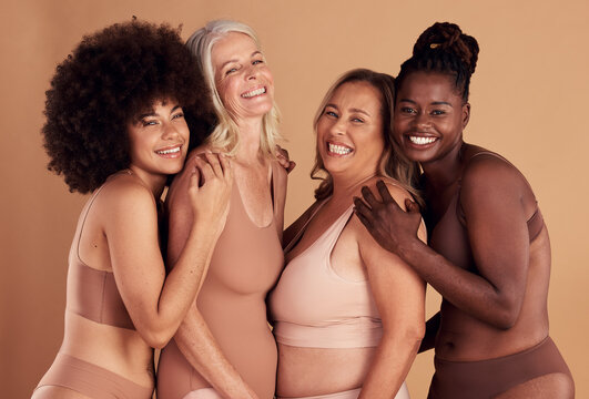 Diversity, happy and women with natural beauty, skincare and cosmetics together on studio background. Portrait group of female models in underwear for wellness, real body positivity and self love