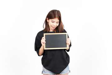 Fototapeta premium Showing, Presenting and holding Blank Blackboard Of Beautiful Asian Woman Isolated On White