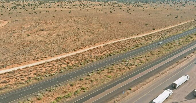 Panorama view highway an America located west of San Jon, New Mexico, USA in desert environment.