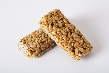 Kozinak from sunflower seeds on a white background. Traditional Georgian sweetness