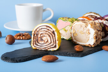 Turkish sweets on a serving board. Focus on Turkish delight with lemon