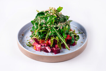 Arugula salad with spinach on a white background