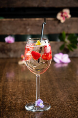 tasty cocktail on the wooden background