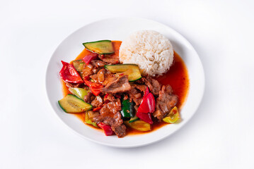 meat with vegetables and rice on a white background