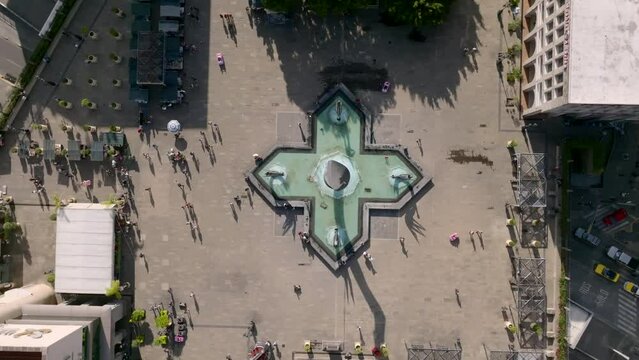 Topdown View Of Inmolacion de Quetzalcoatl Sculpture At The Plaza Tapatia In Guadalajara, Jalisco, Mexico. aerial rotating