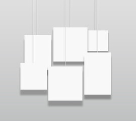 Several poster media template frames hanging on the wall