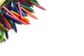 Crayons lined up isolated on white background.