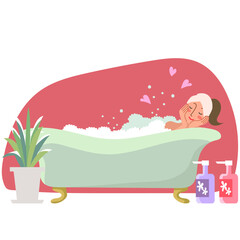 バスタブでリラックスする若い女性