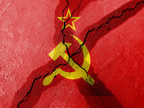 The broken cement block merged with the Soviet Union flag. Symbol of disintegration