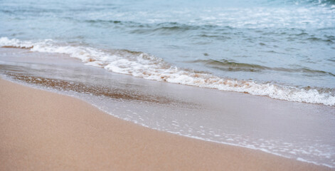 Fototapeta na wymiar Sea shore and sandy beach close up, nature minimalistic landscape background
