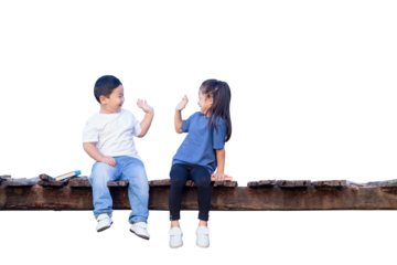 Children sitting on wooden bridge, Happy kids boy and girl having fun outdoor, brother and sister playing outdoors
