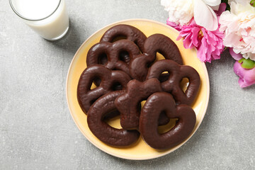 Concept of tasty bakery, gingerbread cookies in chocolate, top view