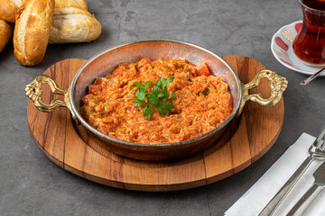 Traditional turkish breakfast food menemen made by eggs and tomatoes