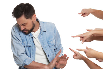 People bullying scared man on white background