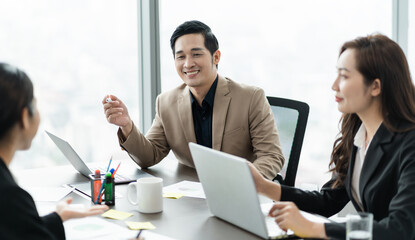 image of a group of Asian businessmen working together at the company