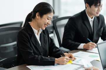 image of a group of Asian businessmen working together at the company