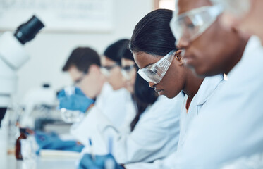 Study, research and scientist team in a lab for medical, innovation and drug analysis, health and...