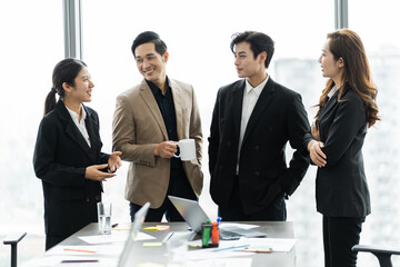 image of a group of Asian businessmen working together at the company