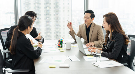 image of a group of Asian businessmen working together at the company