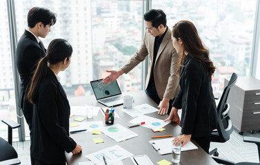 image of a group of Asian businessmen working together at the company
