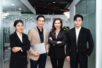 image of a group of Asian businessmen working together at the company