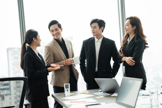 image of a group of Asian businessmen working together at the company