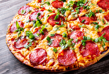 Pepperoni Pizza with cheese, salami, Tomato sauce, pepper, Spices