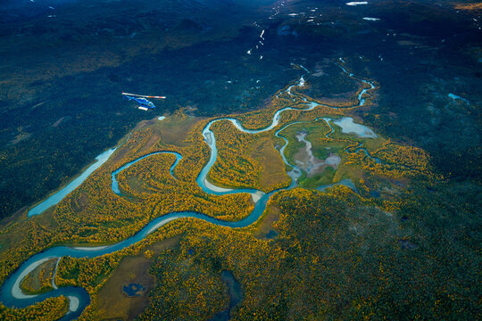 Aerial View of Helicopter Flying over Rivers of Swedish lapland, Sweden,