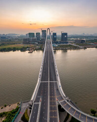 PANORAMA WITH SAI GON RIVER AND BA SON BRIDGE. VIEW FROM DISTRICT 1 TO THU THIEM, HO CHI MINH CITY,...