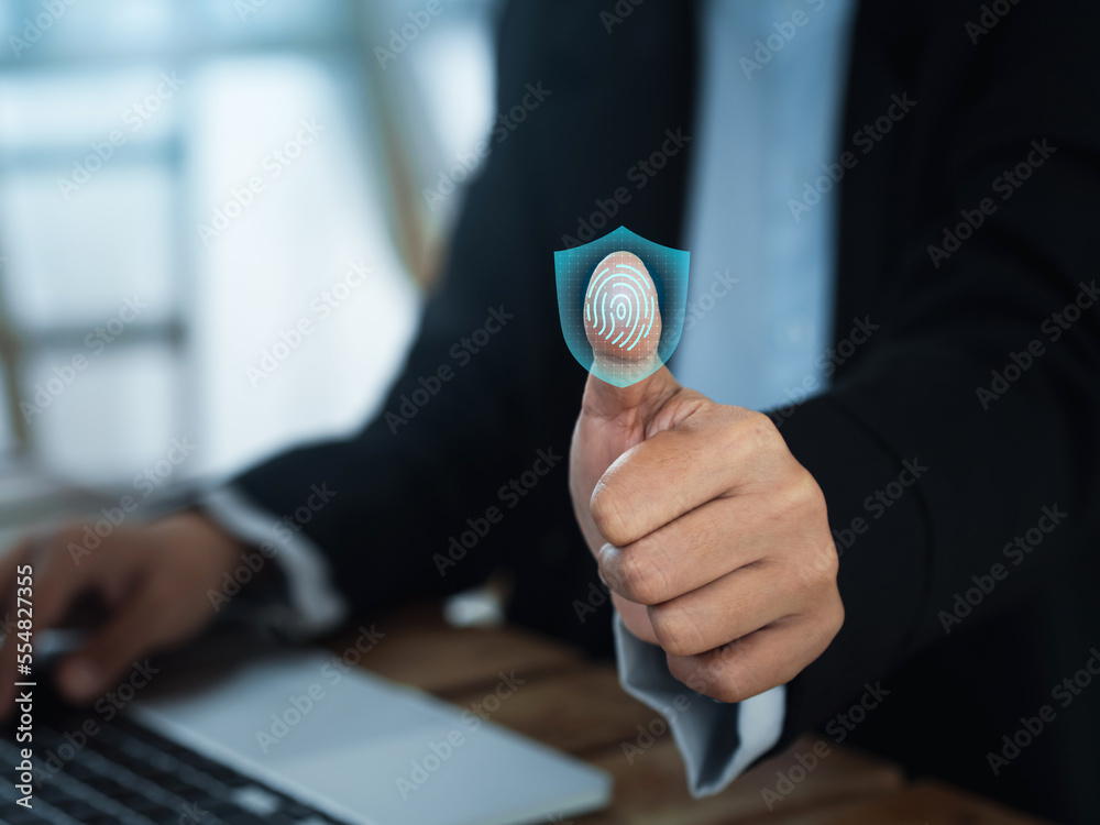 Poster fingerprint scan with digital safety shield icon on virtual screen while thumb scanning for security