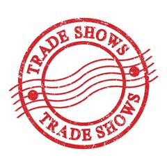 TRADE SHOWS, text written on red postal stamp.