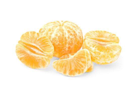 Fresh juicy peeled tangerines on white background