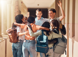 Group of people, happy students and hug for education celebration, interracial support or study project success. Diversity, university friends celebrate and hugging happiness in building corridor