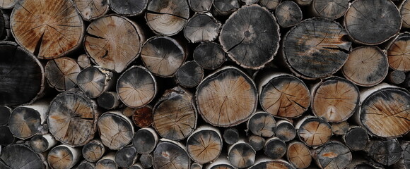 different round wooden disks as a background on a board	

