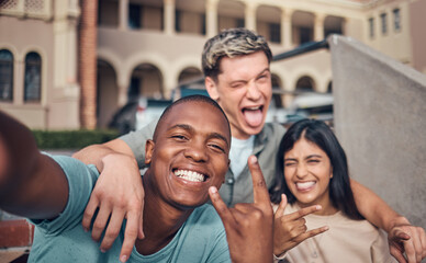 Friends selfie, smile and portrait on university campus with diversity, happy and funny face, hand gesture and rock sign. Happy, portrait and interracial college friendship, students and photograph