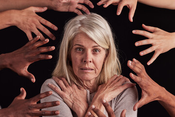 Anxiety, schizophrenia and face of woman with hands reach in horror, fear and black background for...
