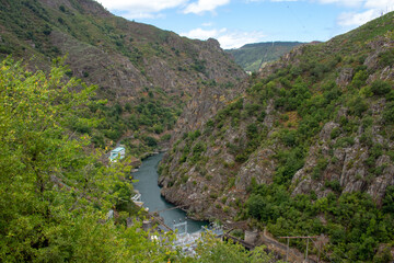 Fototapeta na wymiar The Santo Estevo Reservoir and Hydroelectric plant in Ourense, Spain. Dam station on river Sil.