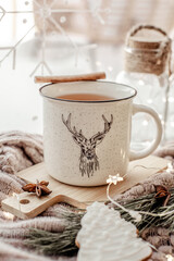 Christmas tea in the mug with reindeer 