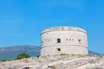 Fototapeta na wymiar Fort on Mamula Island in Kotor Bay from Montenegro . Fortin De Lastavica , islet in the Adriatic Sea