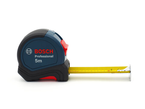 ROME, ITALY - DECEMBER 19, 2022. Bosch Professional 5m measuring tape isolated on white background. Bosch is a German multinational engineering and technology company.