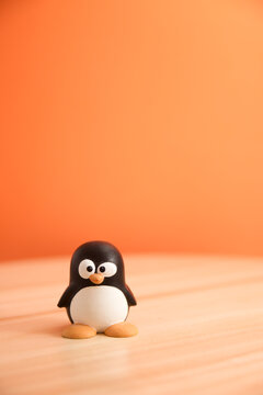 Close up of isolated Tux penguin, emblem of GNU/Linux operating system. Copyspace.