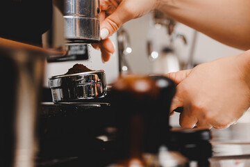 Close up process of preparation coffee latte art drink on machine, espresso is poured into cup