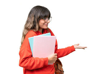Young student caucasian woman over isolated background with surprise expression while looking side