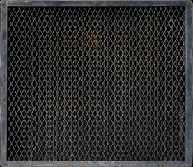 Dirty black metal mesh of industrial machinery radiator texture background