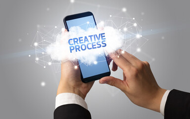 Hand using smartphone with cloud business concept