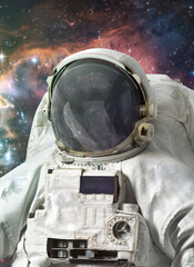 Astronaut in deep bright space. Spaceman look in universe. Elements of this image furnished by NASA