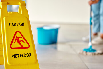Spring cleaning, wet or floor with mopping sign on home or office building in hygiene maintenance, healthcare or bacteria wellness. Zoom, information or housekeeping warning board for slipping safety