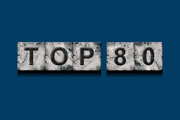 Top 80, words, above different numbers, on a dark blue background. Alphabet on stone blocks.Rating. Rating concept.